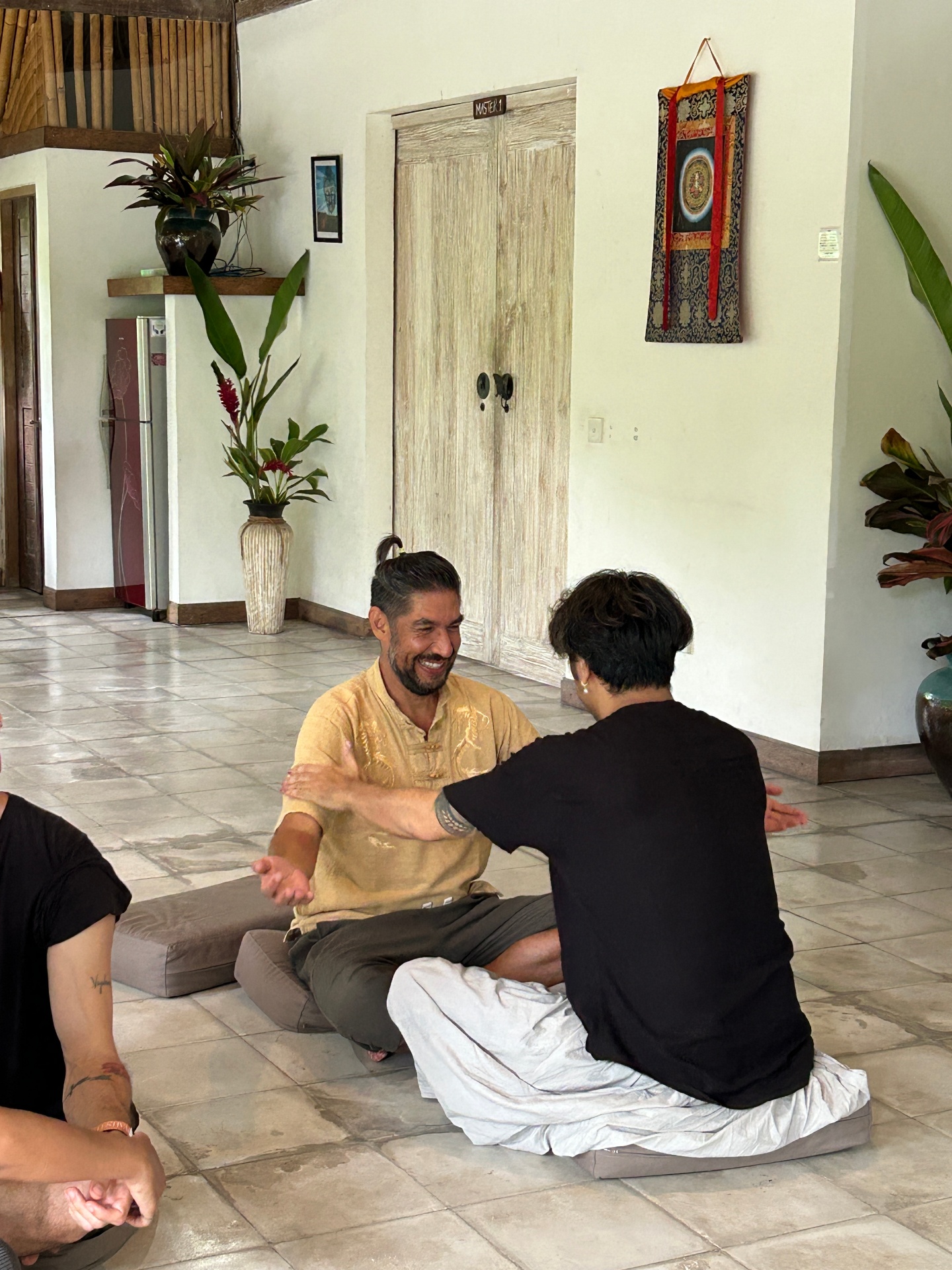Two participants in a guided relational exercise, exploring presence and communication