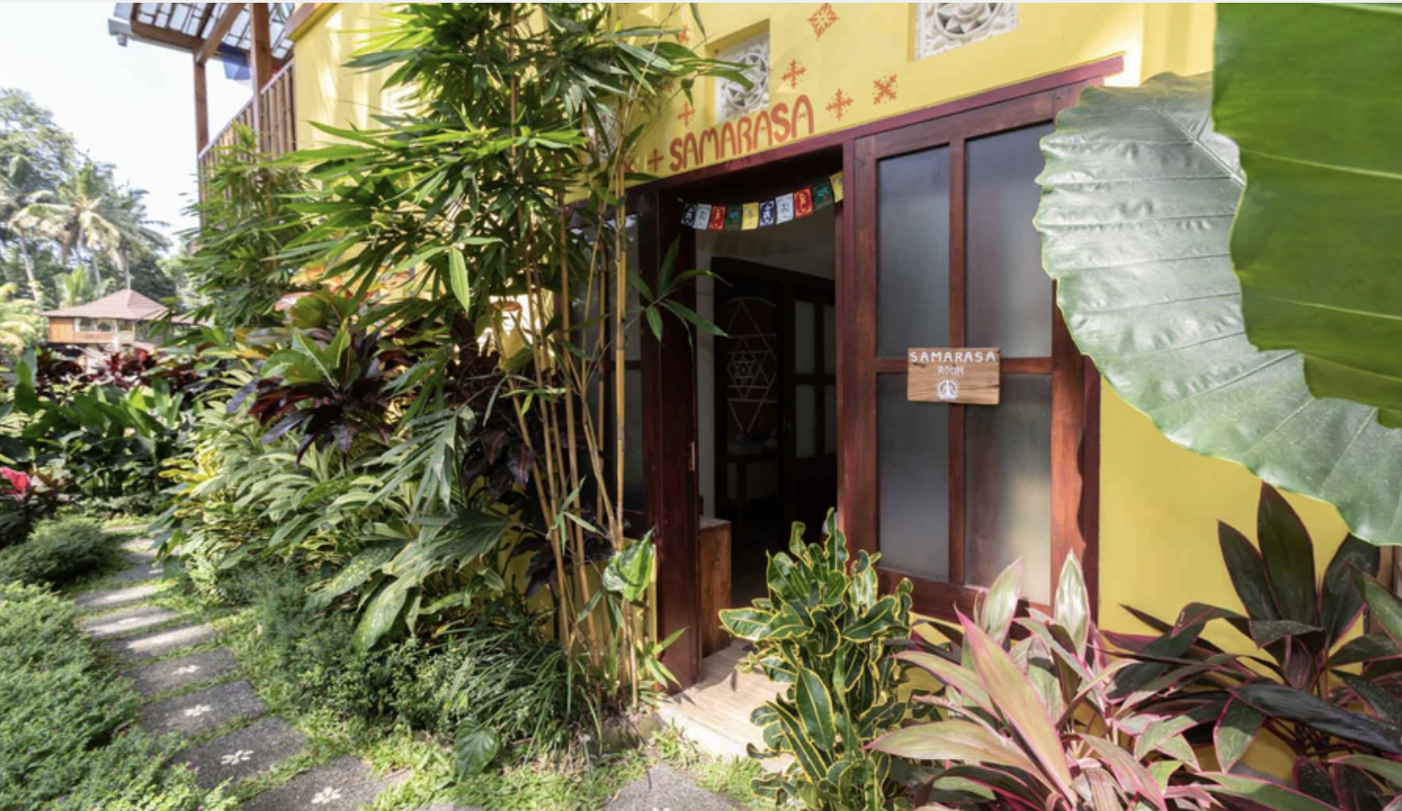 Samarasa room entrance framed by tropical greenery